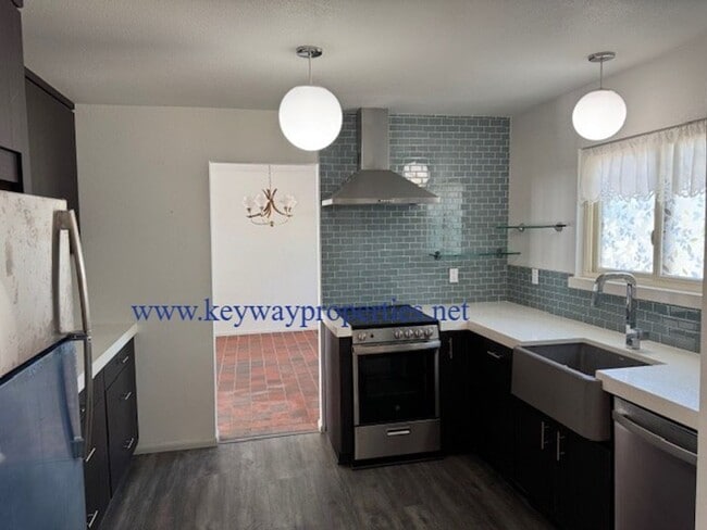 Building Photo - Welcome to Your New Home in NE Heights – Spacious, Stylish, and Full of Charm!