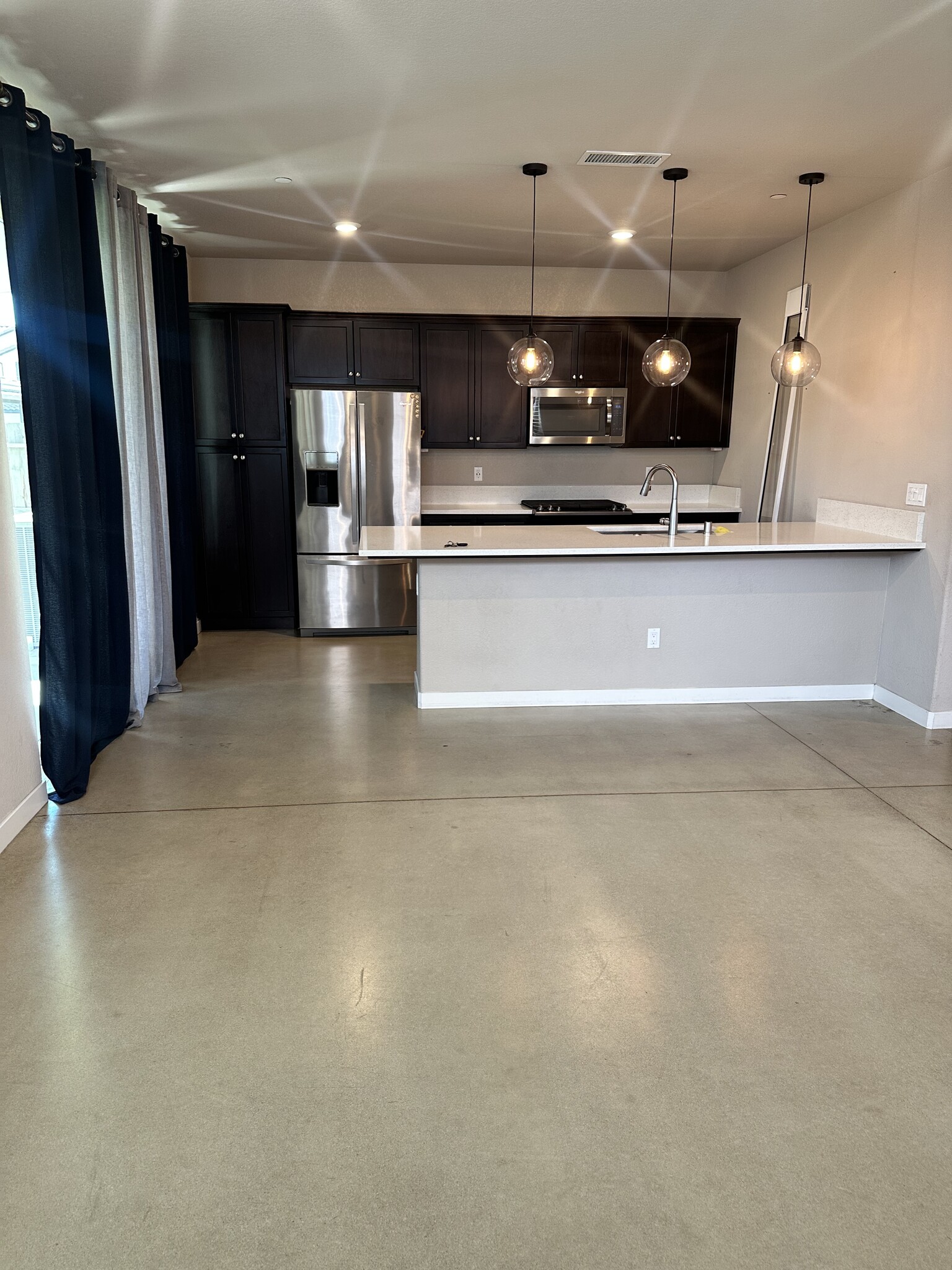 Kitchen view from living room - 2572 N McArthur Ave