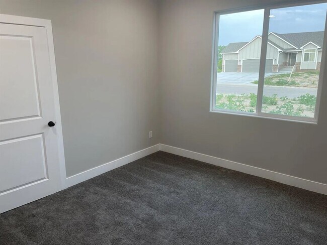 Building Photo - Single family slab home with three car garage. This home is 4 bedrooms, three bathrooms open floo...