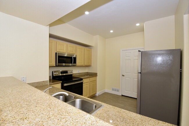 Building Photo - Upgraded & Charming Two-Bedroom Condo with Prime Location At Coronado Palms!