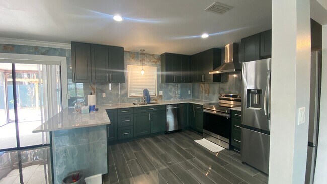 Building Photo - Stunning Remodeled 3BR Home Minutes from Beaches & Shopping