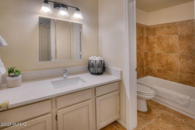 Building Photo - 6655 N Canyon Crest Dr