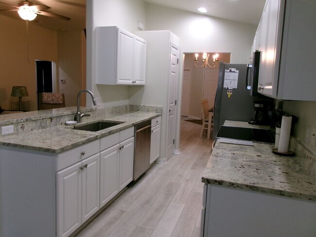 Building Photo - Desirable Gated Sandoval of Cape Coral