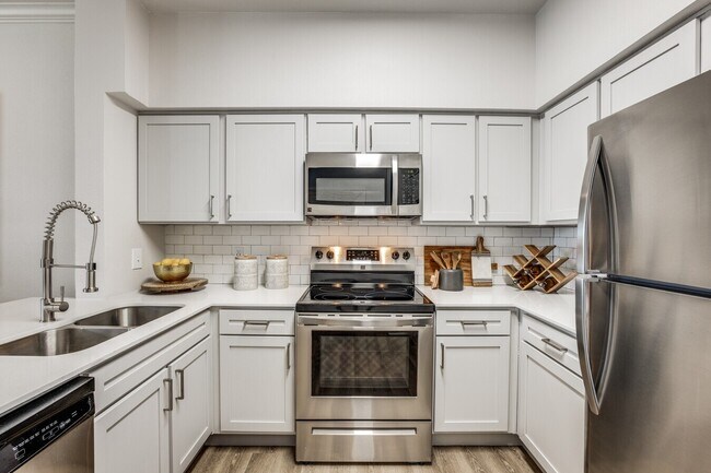 Building Photo - Where Style Meets $1,000 Savings