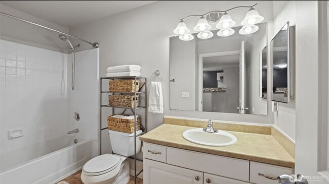 Building Photo - Great location, quiet first floor end unit...