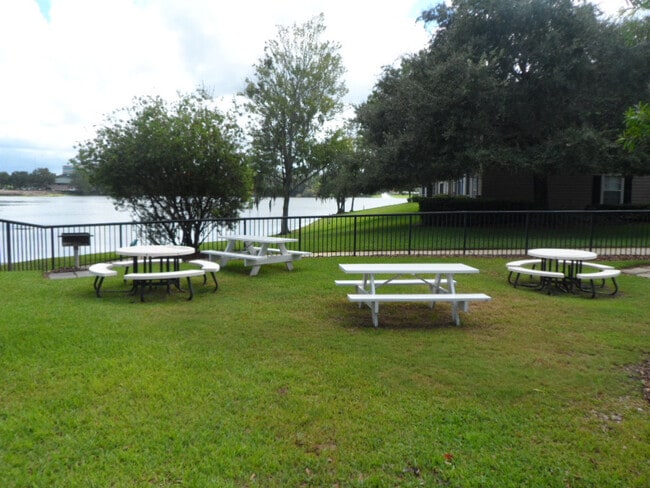 Building Photo - 1/1 lake and pool view with 1 car detached...