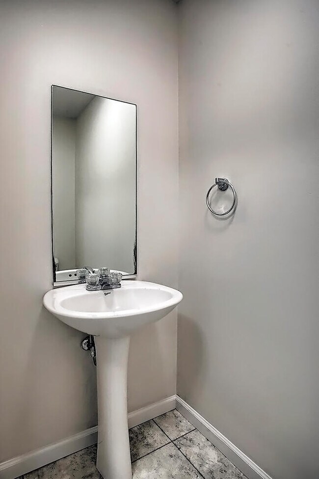 Lower level half bath - 304 Windwood Ct
