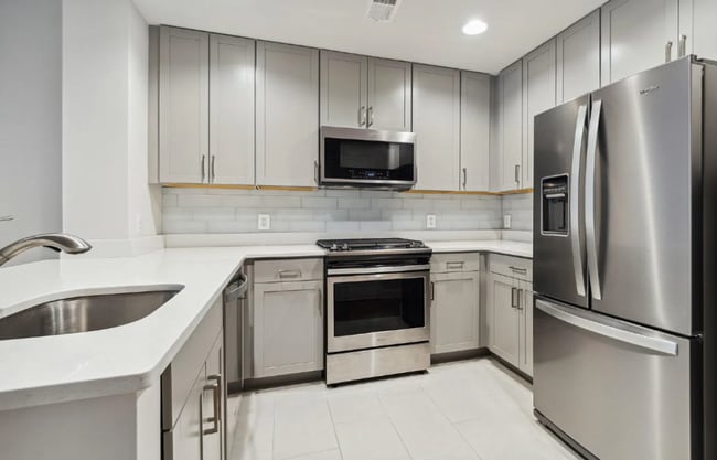 Building Photo - Modern and Stunning 1 Bedroom, 1 Bath + Den Condo in the popular Lexicon – Available Now!