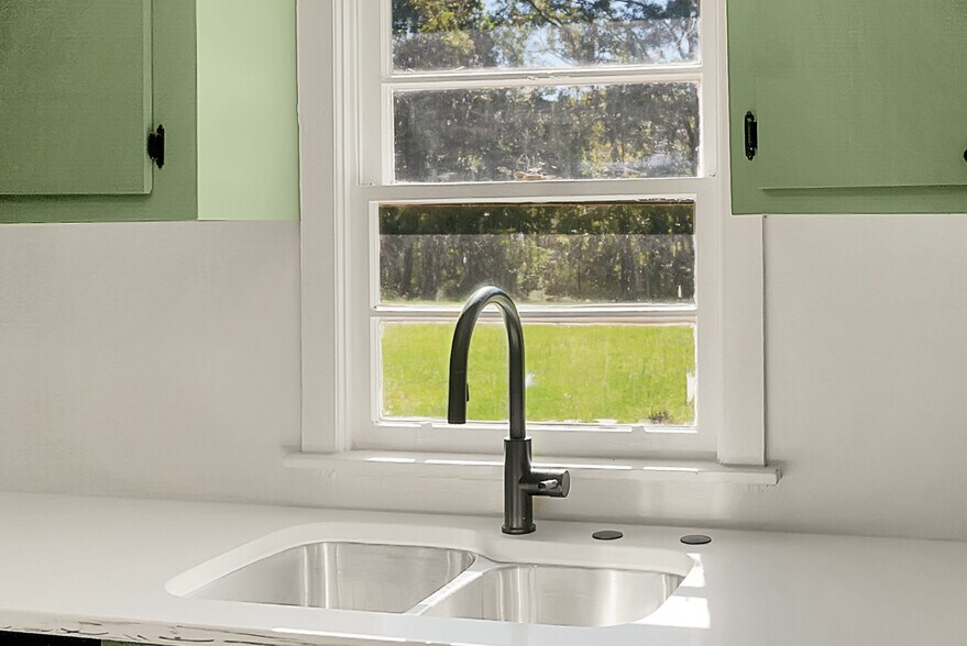 Kitchen overlooking back yard and Burden Creek - 2735 Exchange Landing Rd