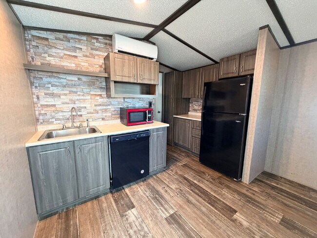 Building Photo - Tiny home, big lifestyle!