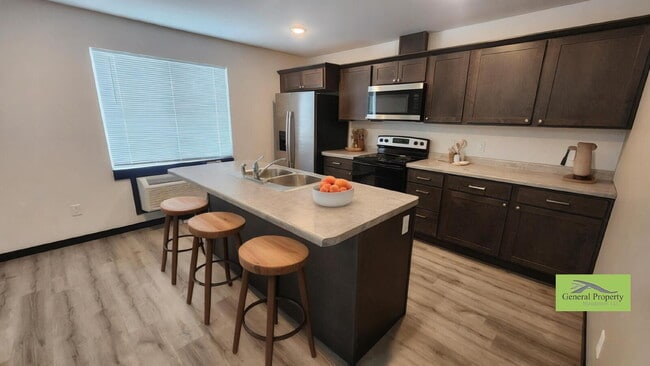 Building Photo - Available April 1st - Modern 2 Bedroom, 2 Full Bathroom with Garage