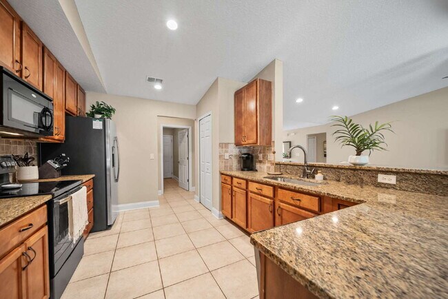 Building Photo - Luxurious Palm Coast Retreat: 4-Bed 3 Bath Pool Home