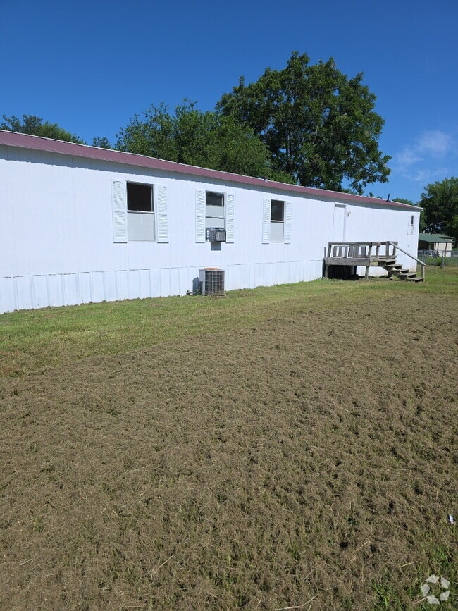Building Photo - "Charming 3-Bed, 2-Bath Mobile Home Oasis ...