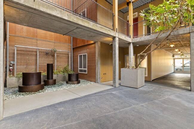 Building Photo - Industrial Belltown Loft with Roof Top Dec...