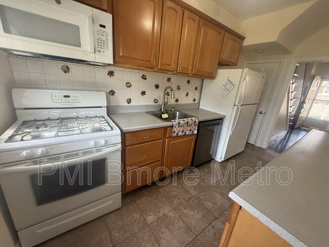 Building Photo - 3609 Woodlea Ave