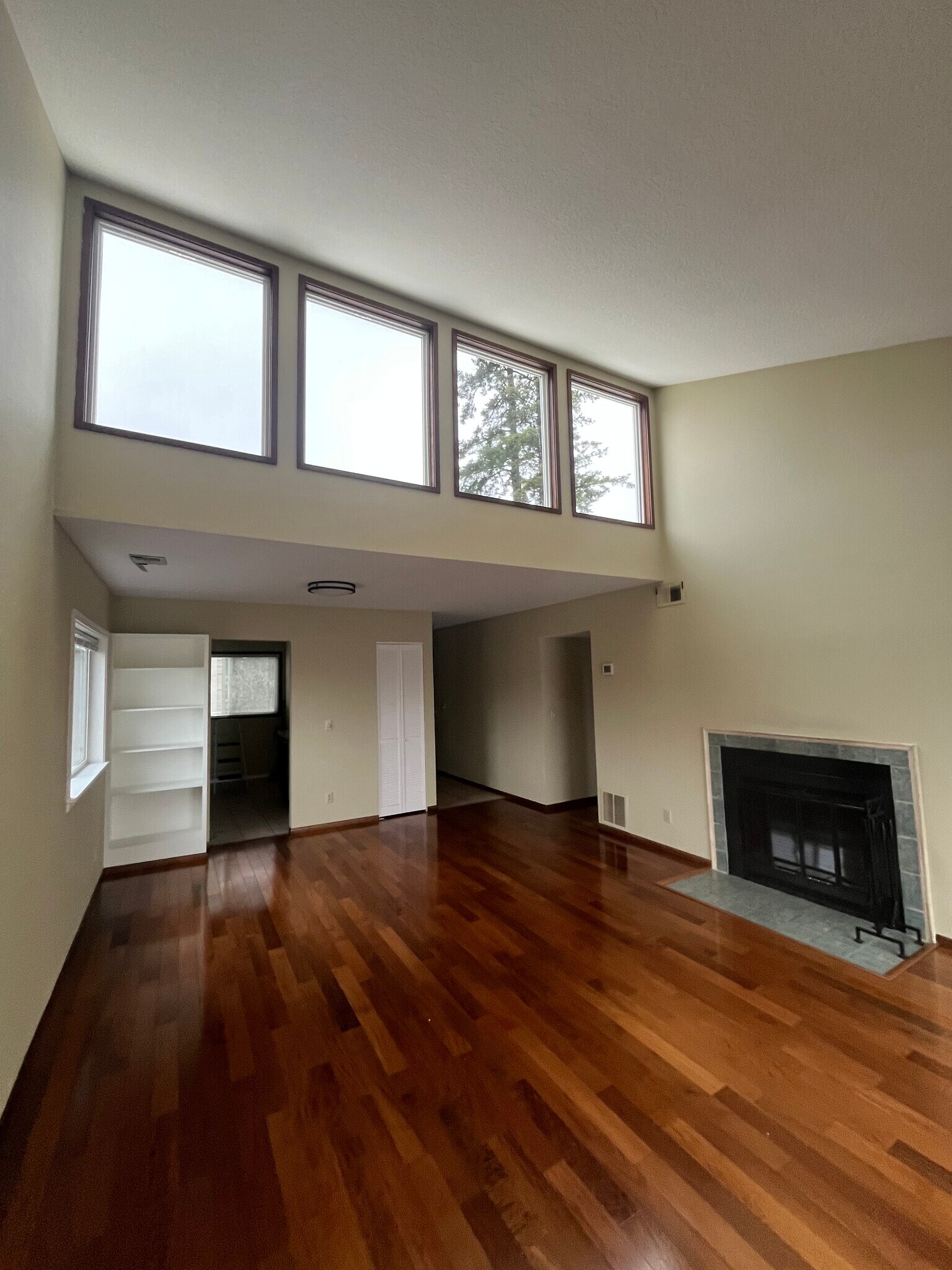 Pop-up windows (facing north) above living room with wood burning fireplace - 7511 N Edgewater Ave