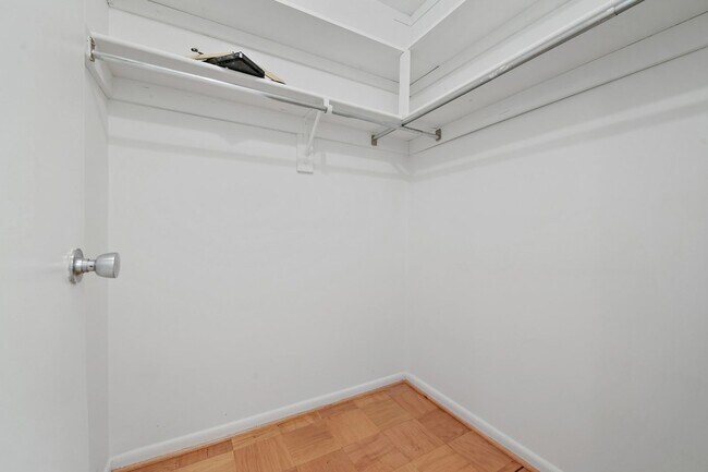 Building Photo - Spacious, and Sunlit 1 BD/1 BA Condo w/Reserved Garage Parking and Utilities Included in Chevy Ch...