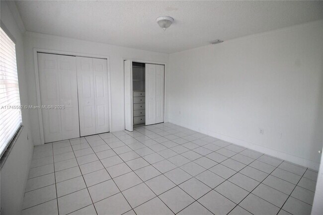 Building Photo - Northwest 57th Court, Hialeah, FL 33015 - ...
