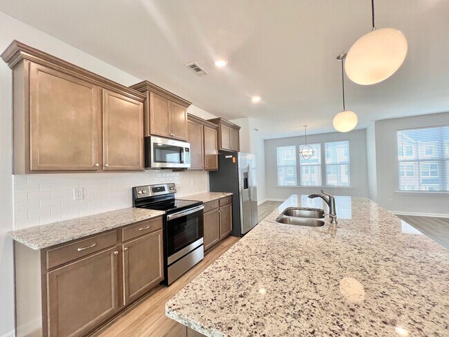 Building Photo - Stunning 4BD, 3.5BA Knightdale Townhome with a 2-Car Garage in an HOA Community