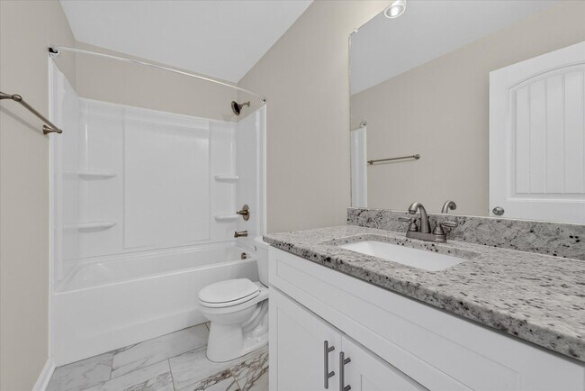 Building Photo - Like New Three Bedroom with Bonus!