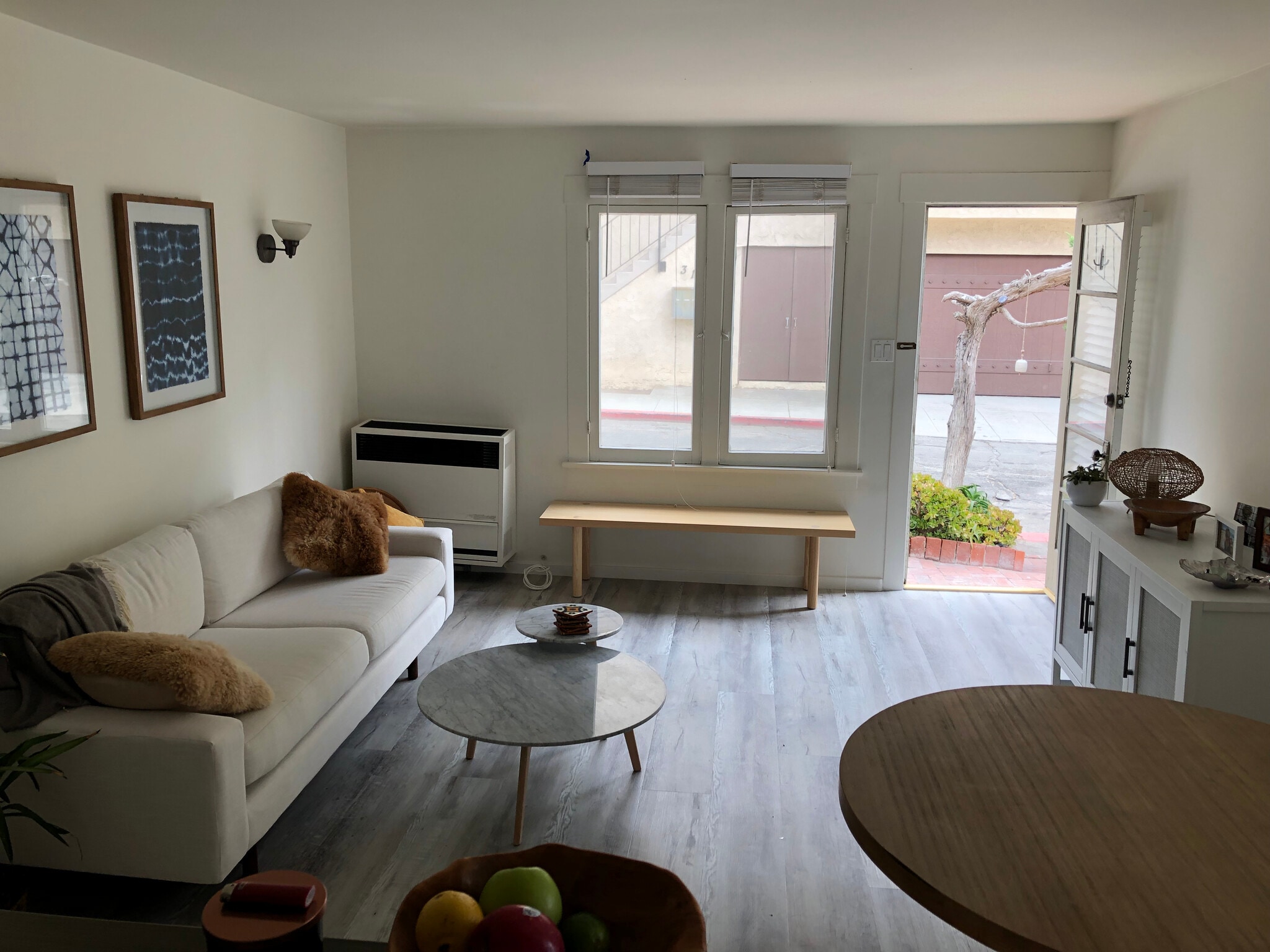 Living room has 3 large windows plus a glassdoor. - 315 4th St