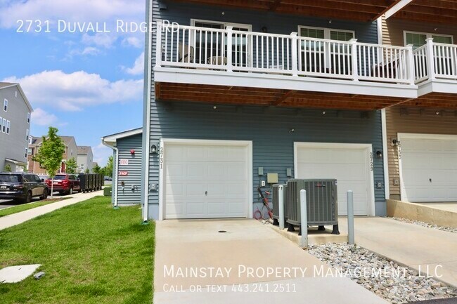 Building Photo - 2 Bedroom Plus DEN End Unit Townhome W Gar...