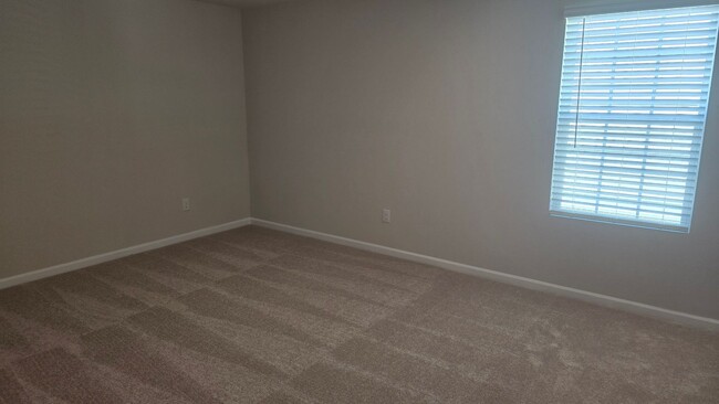 Building Photo - New Home with 5BR/2.5BA, Loft Area, Primar...