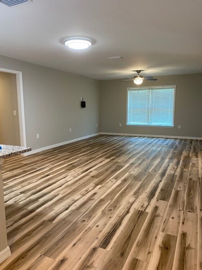 Building Photo - RENT BY THE ROOM - 1/2 or Whole Home!