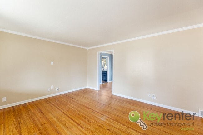 Building Photo - Inviting 3-Bedroom Home with Updated Kitchen & Fenced Backyard – Derby, KS