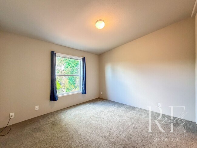 Building Photo - Home with Water Views and Covered Porch