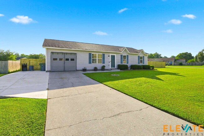Building Photo - Beautiful Like-New 3 Bedroom Home with Huge Fenced Yard, Greenhouse & Storage