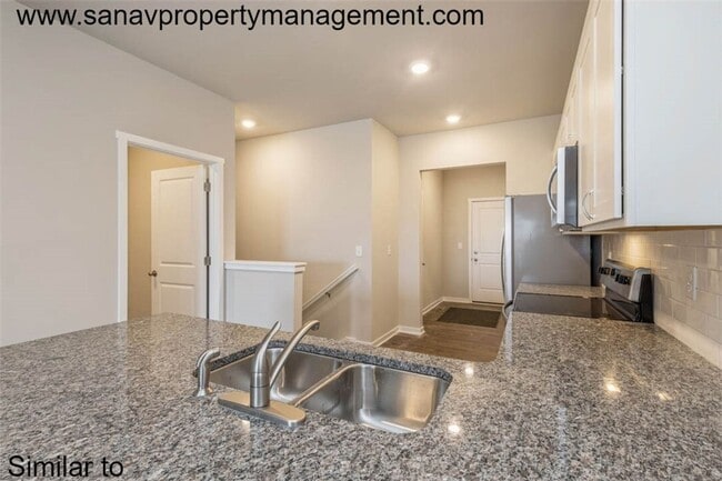 Building Photo - Modern Charm: 2-Bedroom, 2-Bathroom Home with Open Floor Plan and Rear Load Garage