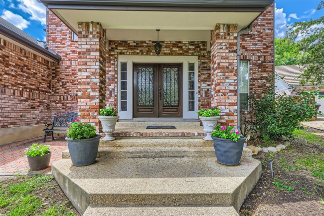 Building Photo - Stunning Home in Guard Gated Community ~ I...