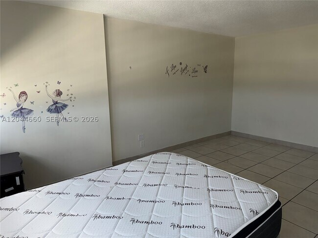 Building Photo - 4675 W 18th Ct