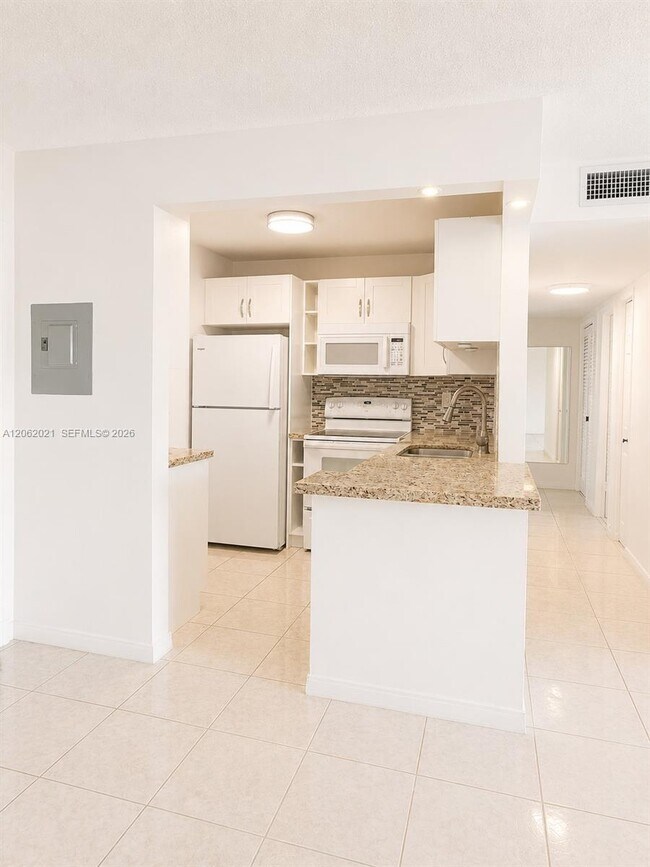 Building Photo - 6095 W 18th Ave