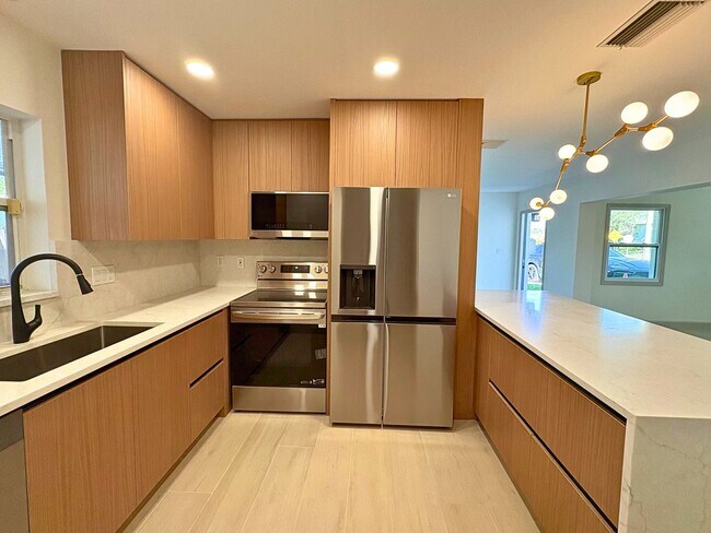 Building Photo - Fully Renovated 2BR Home with Designer Finishes & Fenced Yard