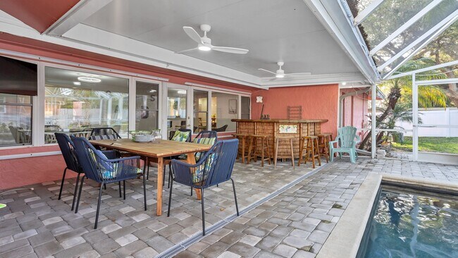 Building Photo - Luxurious FURNISHED 4BR/3BA Pool Home with...