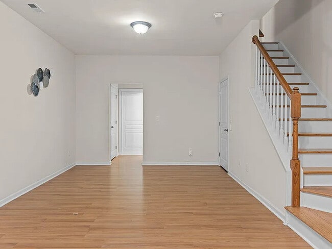 Building Photo - Earn Wealth While Leasing - Like a Homeown...