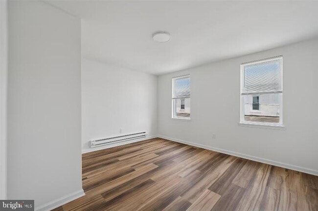 Building Photo - 6123 Glenmore Ave