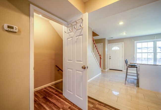 Building Photo - Spacious 3-Level Townhouse with Finished Basement and Fenced Patio