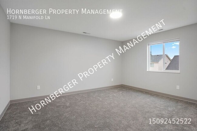 Building Photo - 1719 N Manifold Ln