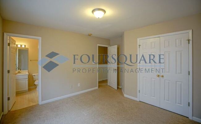 Building Photo - Townhome | 2nd Bedroom Features an En-Suit...