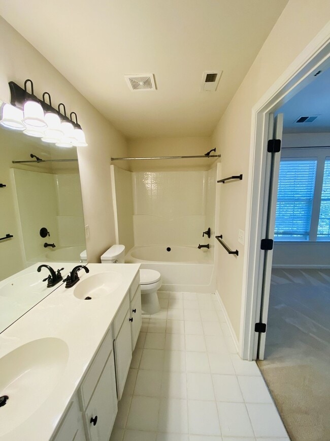 Building Photo - Heart of Ballantyne!  Beautiful End Unit T...