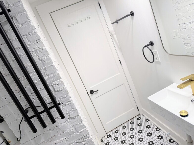 towel warmer & cooler rack, mirror opens for storage shelves - 570 Saint Charles Ave NE