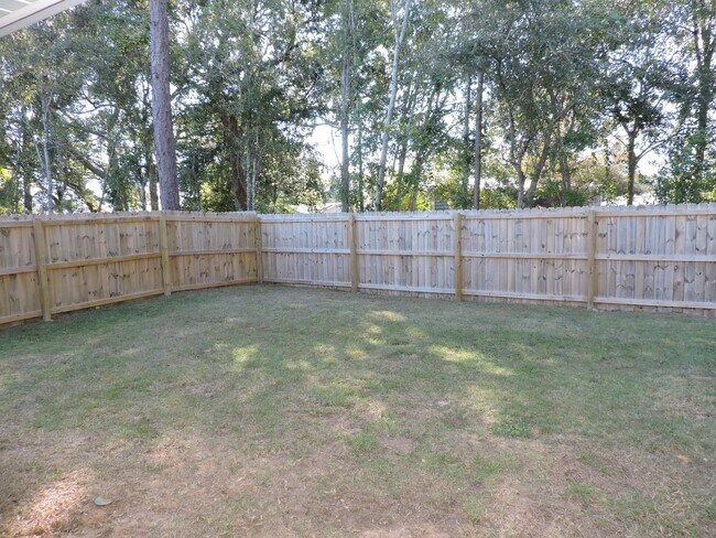 Building Photo - Almost new four bedroom home with solar pa...