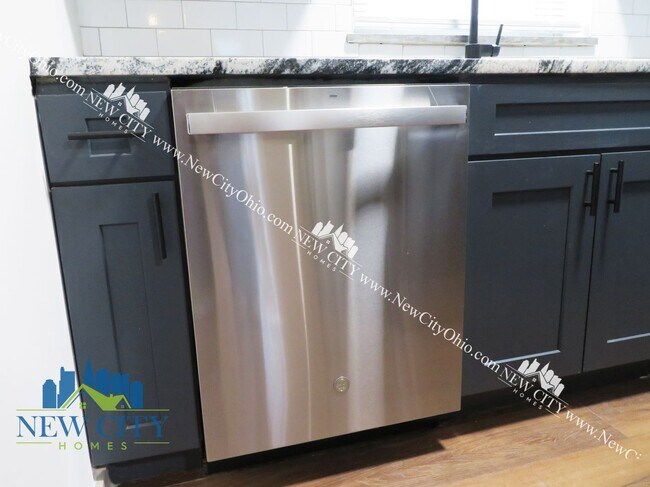 Building Photo - Newly Renovated Apartment Building