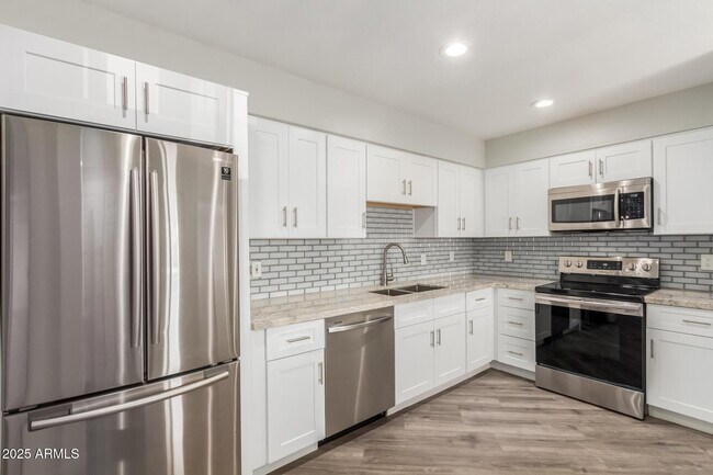 Building Photo - 9460 E Mission Ln