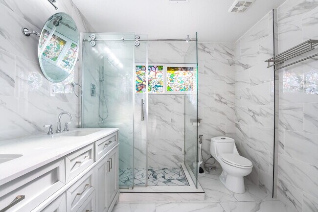 Building Photo - Single Story,  Totally Renovated , 3 bedroom, 2 bathroom Home with  extensive privacy and gated h...