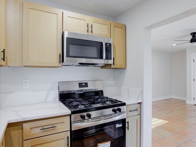 Building Photo - Cozy 2-Bedroom Home with Community Pool & Covered Parking