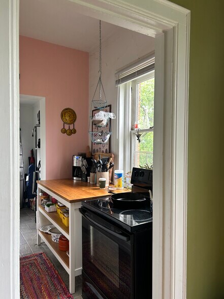 Kitchen with wood work table - 1688 E Broad St